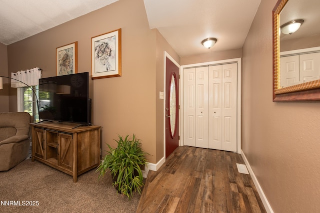 4130 Snowshoe Ln, Reno, NV 89502 - foyer featuring dark wood-type flooring and baseboards