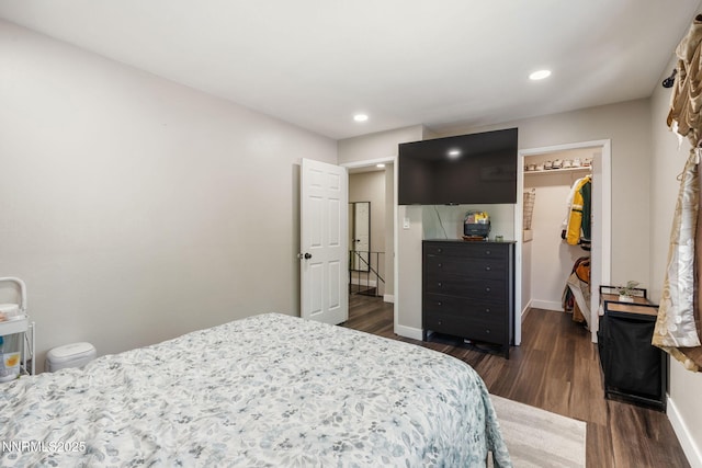 940 Jamaica Ave Unit 3, Reno, NV 89502 - bedroom featuring a spacious closet, dark wood-style flooring, a closet, and recessed lighting