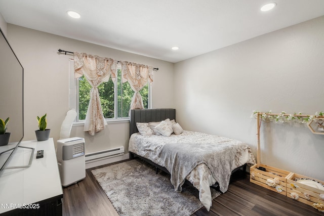 940 Jamaica Ave Unit 3, Reno, NV 89502 - bedroom with a baseboard radiator, wood finished floors, and recessed lighting