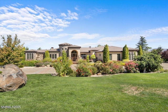 1555 Boulder Field Way, Reno, NV 89511 - mediterranean / spanish-style house with a front lawn, a tile roof, and stucco siding