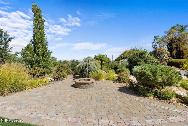 1555 Boulder Field Way, Reno, NV 89511 - view of patio featuring a fire pit