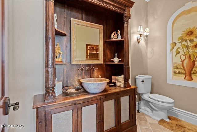 1555 Boulder Field Way, Reno, NV 89511 - bathroom with vanity and baseboards