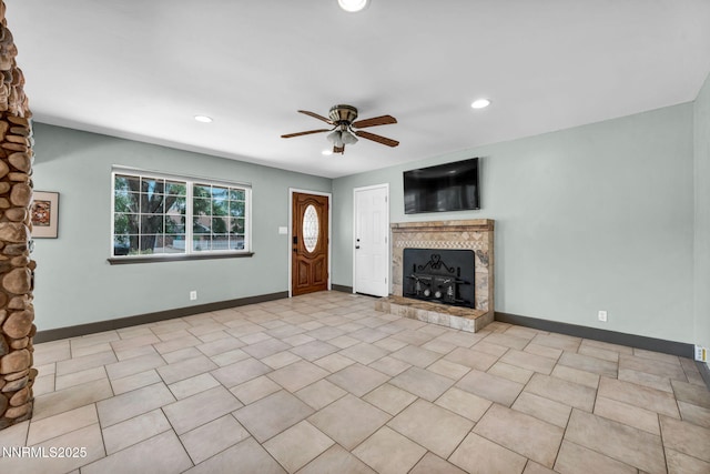 1320 Yori Ave, Reno, NV 89502 - unfurnished living room with a fireplace, ceiling fan, and recessed lighting