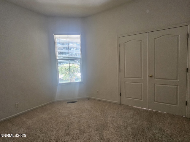 2735 Avenida De Landa, Reno, NV 89523 - unfurnished bedroom featuring carpet floors and a closet