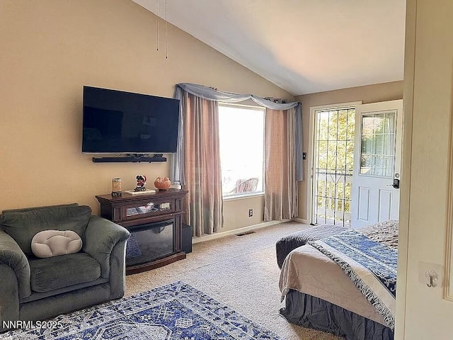6673 Enchanted Valley Dr, Reno, NV 89523 - bedroom featuring vaulted ceiling, access to exterior, and carpet floors