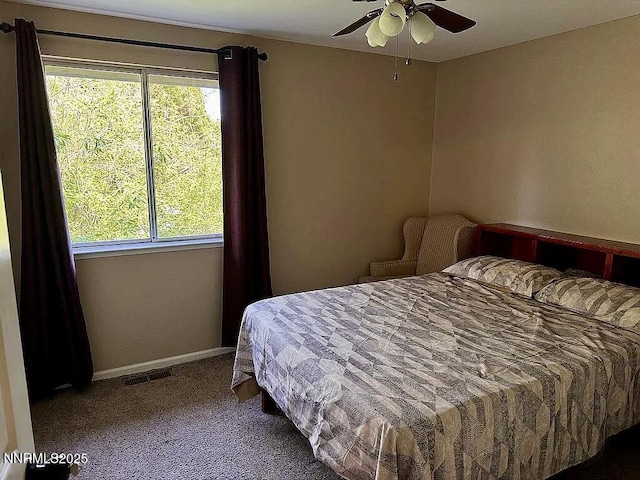 6673 Enchanted Valley Dr, Reno, NV 89523 - carpeted bedroom featuring baseboards and ceiling fan