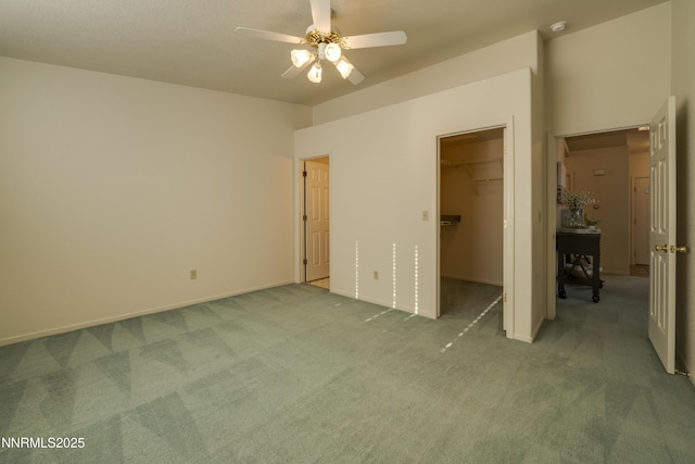 3082 Doubletree Ln, Carson City, NV 89701 - unfurnished bedroom with carpet floors, a walk in closet, a closet, and ceiling fan