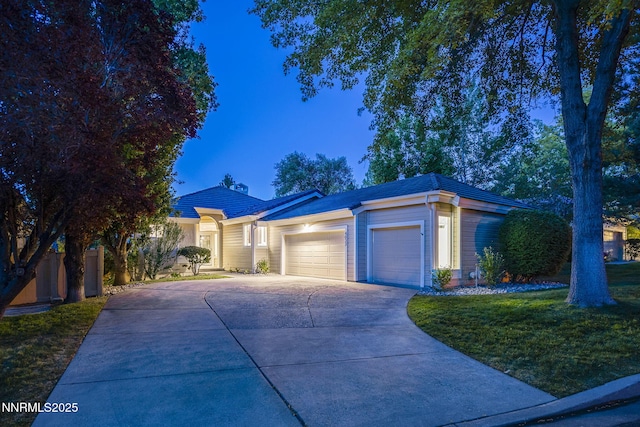 4033 Clover Creek Ct, Reno, NV 89519 - ranch-style house with an attached garage, concrete driveway, and a lawn