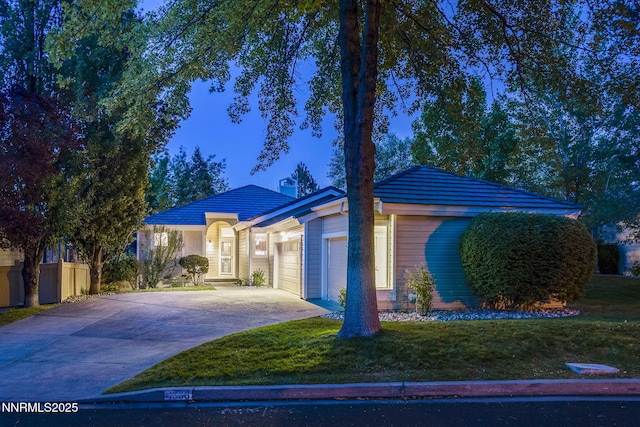 4033 Clover Creek Ct, Reno, NV 89519 - view of front facade with an attached garage, driveway, and a chimney