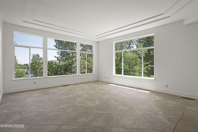 4033 Clover Creek Ct, Reno, NV 89519 - unfurnished room featuring healthy amount of natural light and a tray ceiling