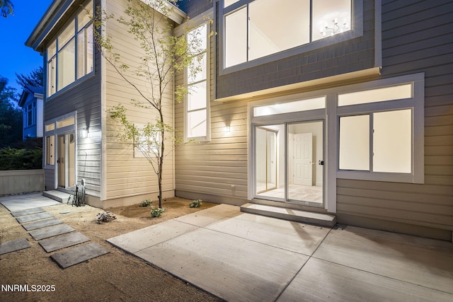 4033 Clover Creek Ct, Reno, NV 89519 - rear view of property featuring entry steps and a patio