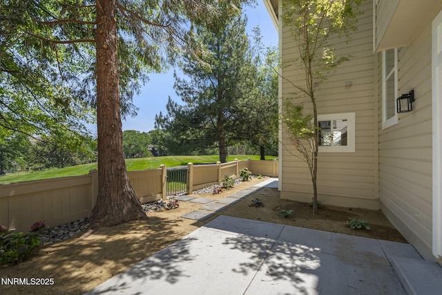 4033 Clover Creek Ct, Reno, NV 89519 - fenced backyard with a patio area