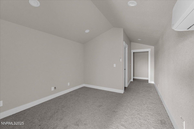 2800 Pamela Pl, Minden, NV 89423 - additional living space featuring an AC wall unit, carpet, and lofted ceiling