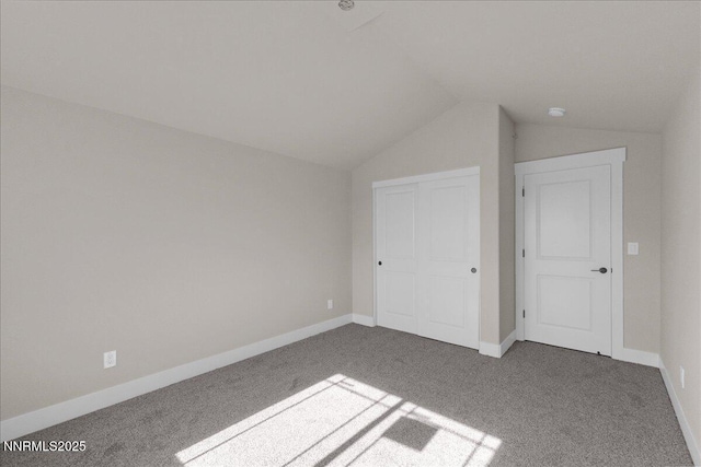 2800 Pamela Pl, Minden, NV 89423 - unfurnished bedroom with carpet flooring, vaulted ceiling, and a closet