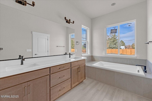 2800 Pamela Pl, Minden, NV 89423 - full bath with a bath, double vanity, and wood finished floors