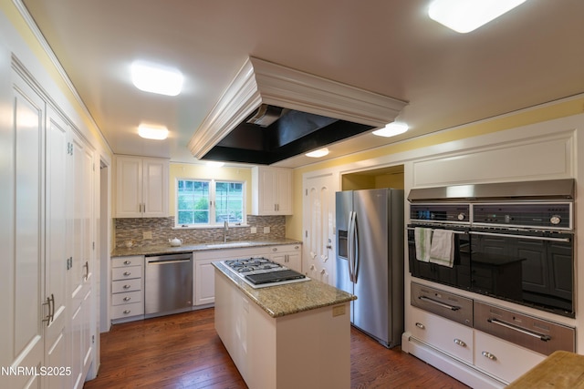 976 Caddie Ct, Incline Village, NV 89451 - kitchen featuring stainless steel appliances, white cabinetry, decorative backsplash, and dark wood finished floors
