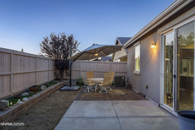 10125 Mesa Cortona Dr, Reno, NV 89521 - fenced backyard featuring outdoor dining space and a patio area