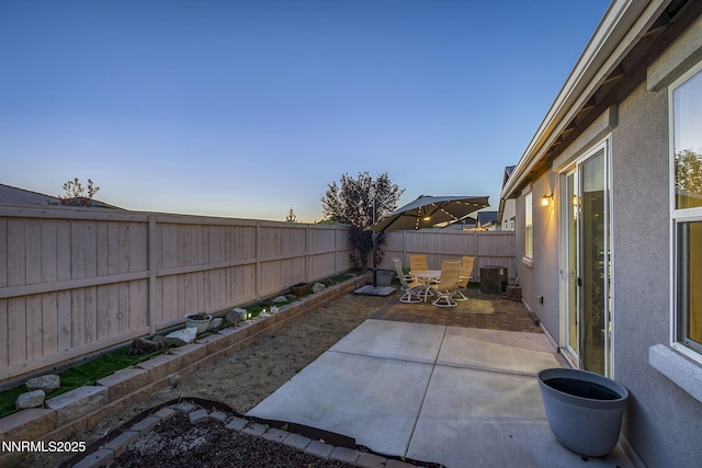 10125 Mesa Cortona Dr, Reno, NV 89521 - fenced backyard with a patio area and outdoor dining area
