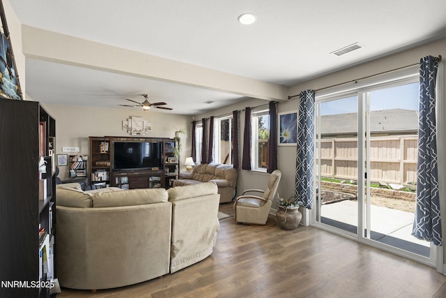 10125 Mesa Cortona Dr, Reno, NV 89521 - living area featuring wood finished floors, a ceiling fan, and recessed lighting