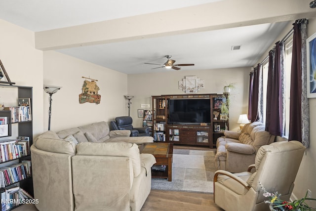 10125 Mesa Cortona Dr, Reno, NV 89521 - living area with ceiling fan and wood finished floors