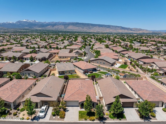 10125 Mesa Cortona Dr, Reno, NV 89521 - aerial perspective of suburban area with a mountain backdrop