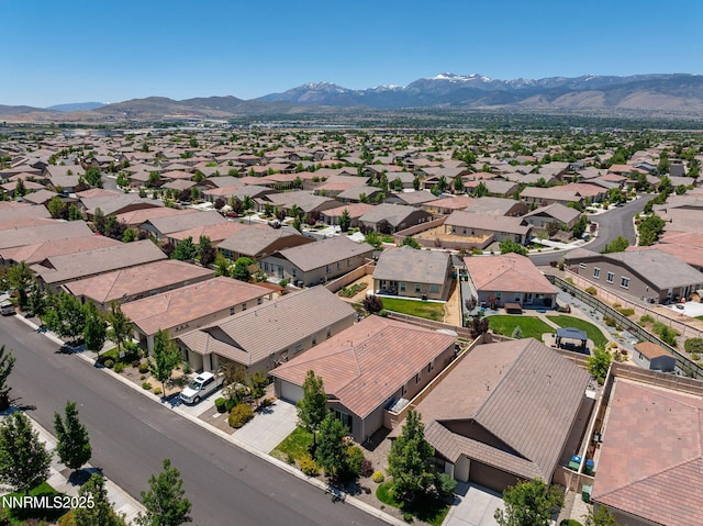 10125 Mesa Cortona Dr, Reno, NV 89521 - aerial view of residential area with a mountainous background