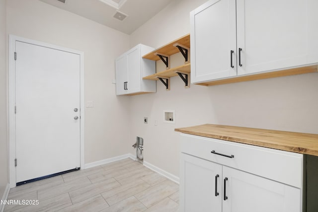 1723 Blue Oak Ct, Fernley, NV 89408 - laundry room featuring hookup for an electric dryer, cabinet space, and hookup for a washing machine