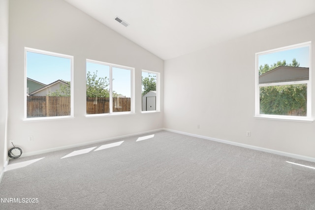 1723 Blue Oak Ct, Fernley, NV 89408 - carpeted spare room featuring lofted ceiling and baseboards