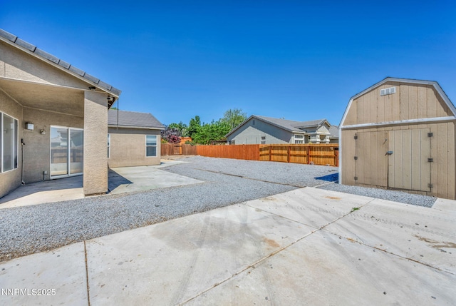 1048 Brierwood Ln, Fernley, NV 89408 - fenced backyard with a patio and a shed