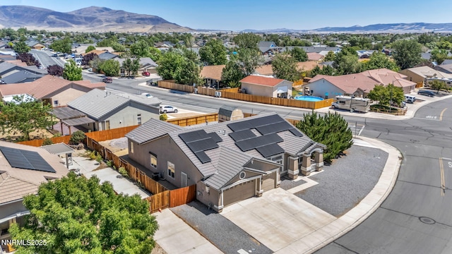 1048 Brierwood Ln, Fernley, NV 89408 - aerial perspective of suburban area with a mountainous background