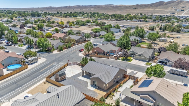 1048 Brierwood Ln, Fernley, NV 89408 - aerial view of residential area featuring a mountain backdrop