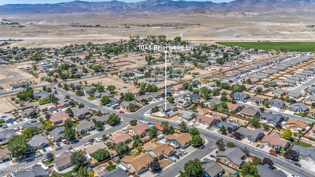 1048 Brierwood Ln, Fernley, NV 89408 - view of property location with a mountainous background and nearby suburban area