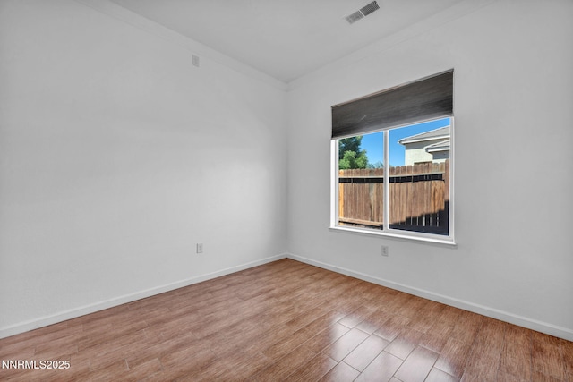 1048 Brierwood Ln, Fernley, NV 89408 - unfurnished room featuring wood finished floors and baseboards