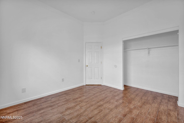 1048 Brierwood Ln, Fernley, NV 89408 - unfurnished bedroom featuring a closet and wood finished floors