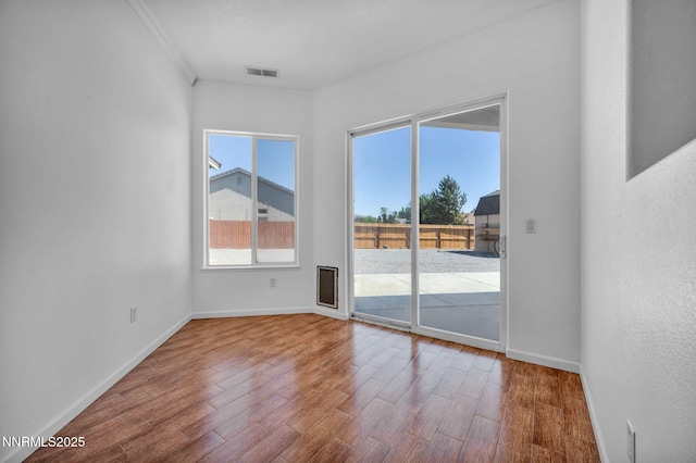1048 Brierwood Ln, Fernley, NV 89408 - unfurnished room with wood finished floors and baseboards