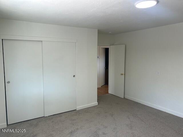 3220 Rice Rd, Fallon, NV 89406 - unfurnished bedroom with carpet floors and a closet