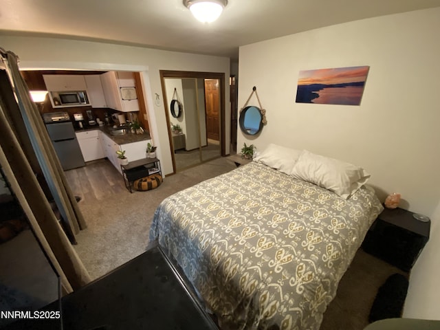 908 Harold Dr Unit 23, Incline Village, NV 89451 - bedroom featuring carpet flooring and a sink