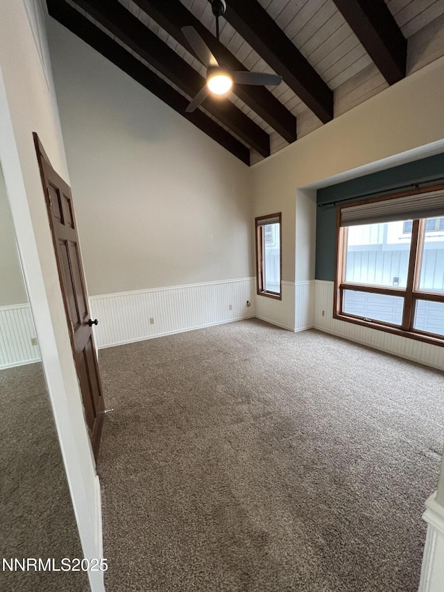 908 Harold Dr Unit 23, Incline Village, NV 89451 - carpeted empty room featuring ceiling fan, wainscoting, a wooden ceiling with exposed beams, and high vaulted ceiling
