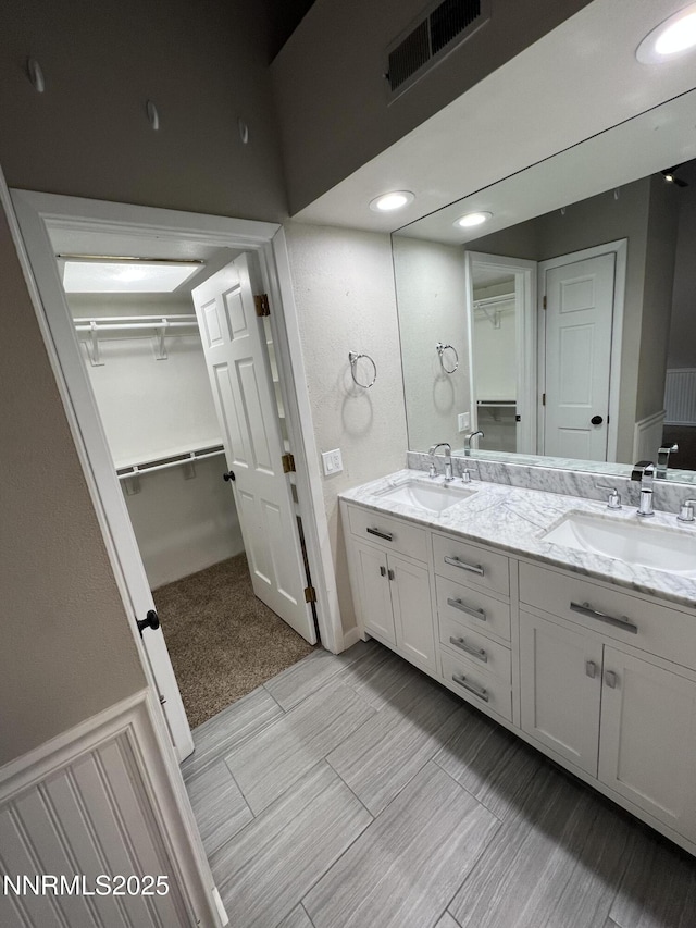 908 Harold Dr Unit 23, Incline Village, NV 89451 - full bath with double vanity, a spacious closet, and recessed lighting