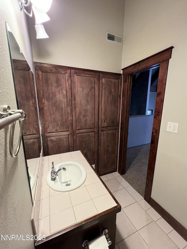 908 Harold Dr Unit 23, Incline Village, NV 89451 - bathroom featuring tile patterned floors and vanity