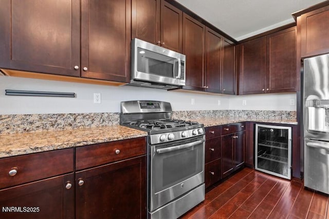 2720 Peavine Pines Ct, Reno, NV 89523 - kitchen with stainless steel appliances, wine cooler, dark wood-style floors, and light stone counters