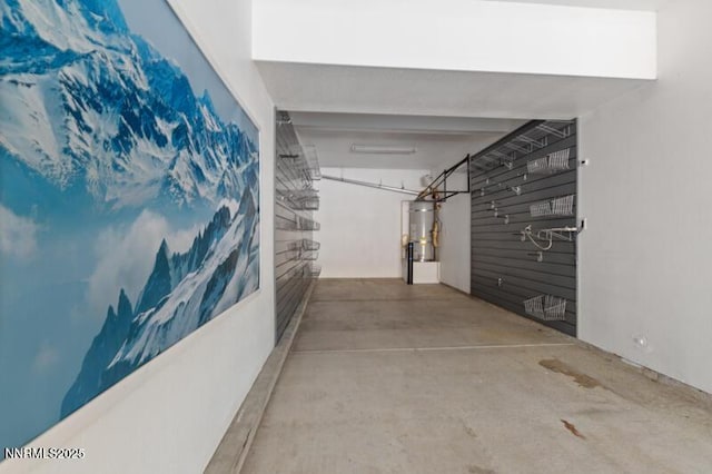2720 Peavine Pines Ct, Reno, NV 89523 - hallway with strapped water heater and concrete flooring