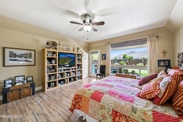 2885 Rio Vis, Minden, NV 89423 - bedroom with wood finished floors, access to outside, and a ceiling fan