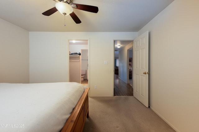 1399 Waterloo Ln, Gardnerville, NV 89410 - bedroom with carpet floors, a walk in closet, ceiling fan, and a closet
