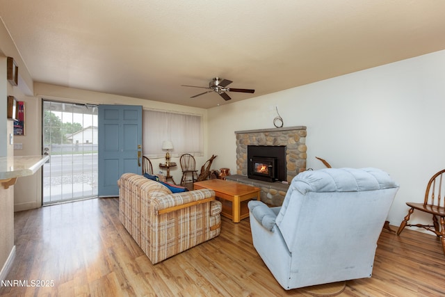 1399 Waterloo Ln, Gardnerville, NV 89410 - living area featuring ceiling fan, light wood-type flooring, and a fireplace