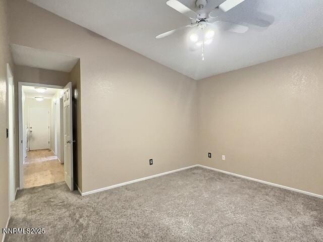 8425 Corrigan Way, Reno, NV 89506 - carpeted empty room with ceiling fan and baseboards