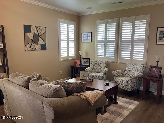 4073 Talladega Dr, Sparks, NV 89436 - living area featuring wood finished floors and crown molding
