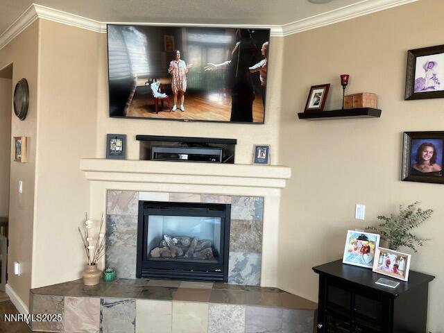 4073 Talladega Dr, Sparks, NV 89436 - detailed view of ornamental molding and a tile fireplace