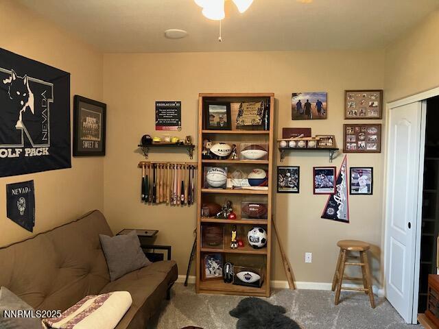 4073 Talladega Dr, Sparks, NV 89436 - carpeted living room featuring baseboards