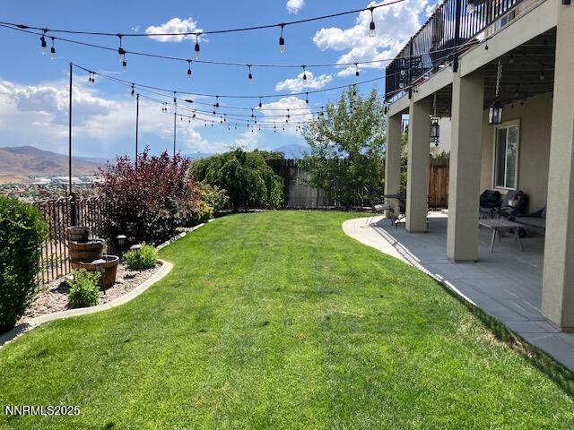 4073 Talladega Dr, Sparks, NV 89436 - fenced backyard with a patio
